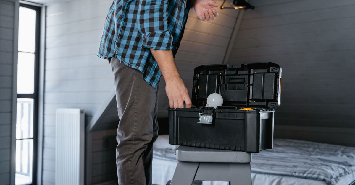 technician toolbox house entrance — Coastal Pro Locksmiths
