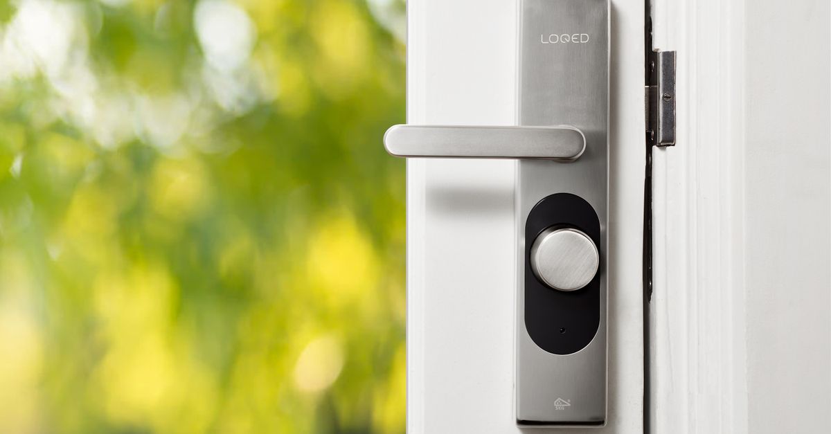 locksmith hands door — Coastal Pro Locksmiths